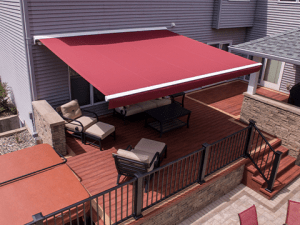 An open awning covers an outdoor patio in the Midwest
