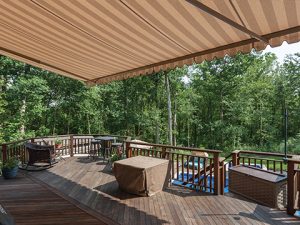 An open awning extending over a back porch in the Southeast