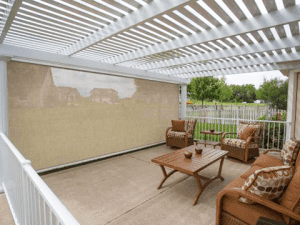 A state-of-the-art Sunesta screen encloses a Northeastern home patio