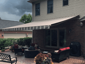 A Sunesta awning is extended before the onset of a storm in the Northeast