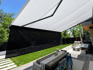 A Sunesta awning extends out over a residential patio in the Southwest